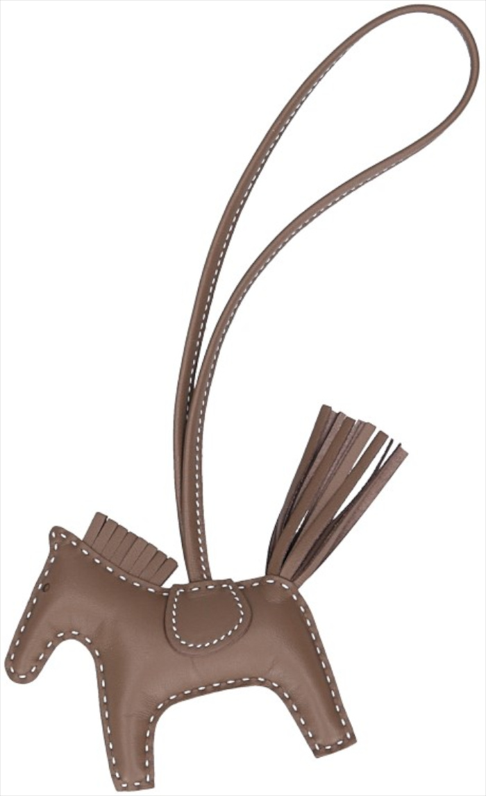 HERMÈS BAG ACCESSORY PENDANT 'Rodeo PM' MADE OF CALF LEATHER IN BLEU ZANZIBAR/ROSE TEXAS