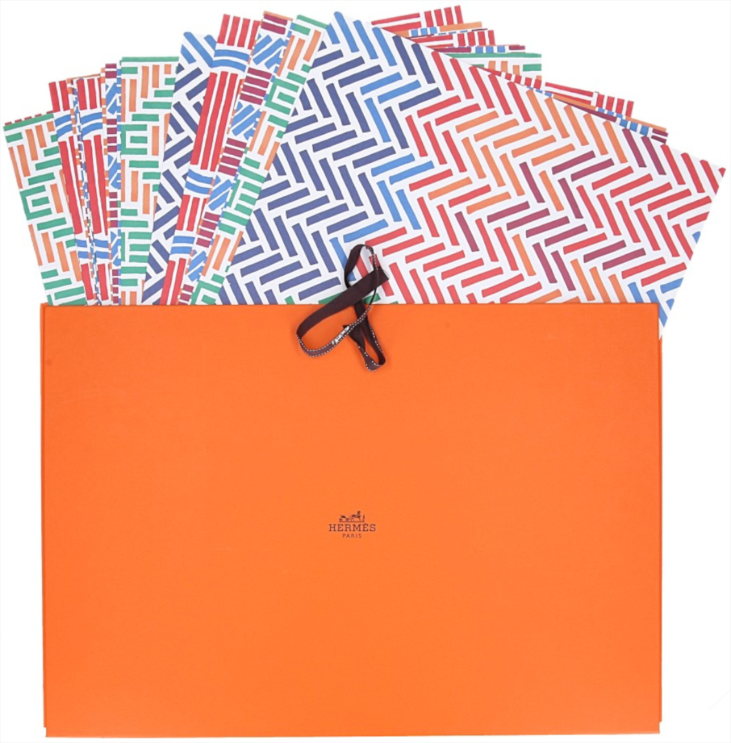 HERMÈS 'TOUTENPAPIER VANNERIE' TISCHSET (24 STÜCK)