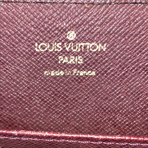 LOUIS VUITTON POCHETTE BAIKAL CLUTCH AUS TAIGA LEDER IN ACAJOU