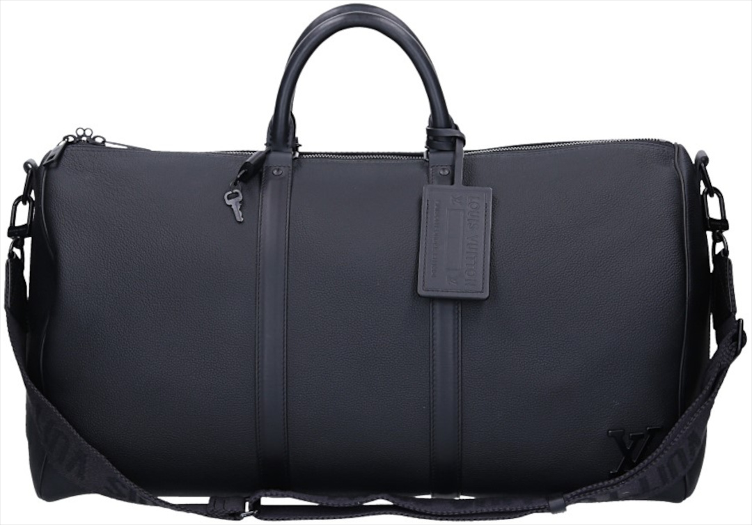 Louis Vuitton Keepall 50 Travel Bag in Monogram Denim with Leather Trim and Shoulder Straps (M45975)