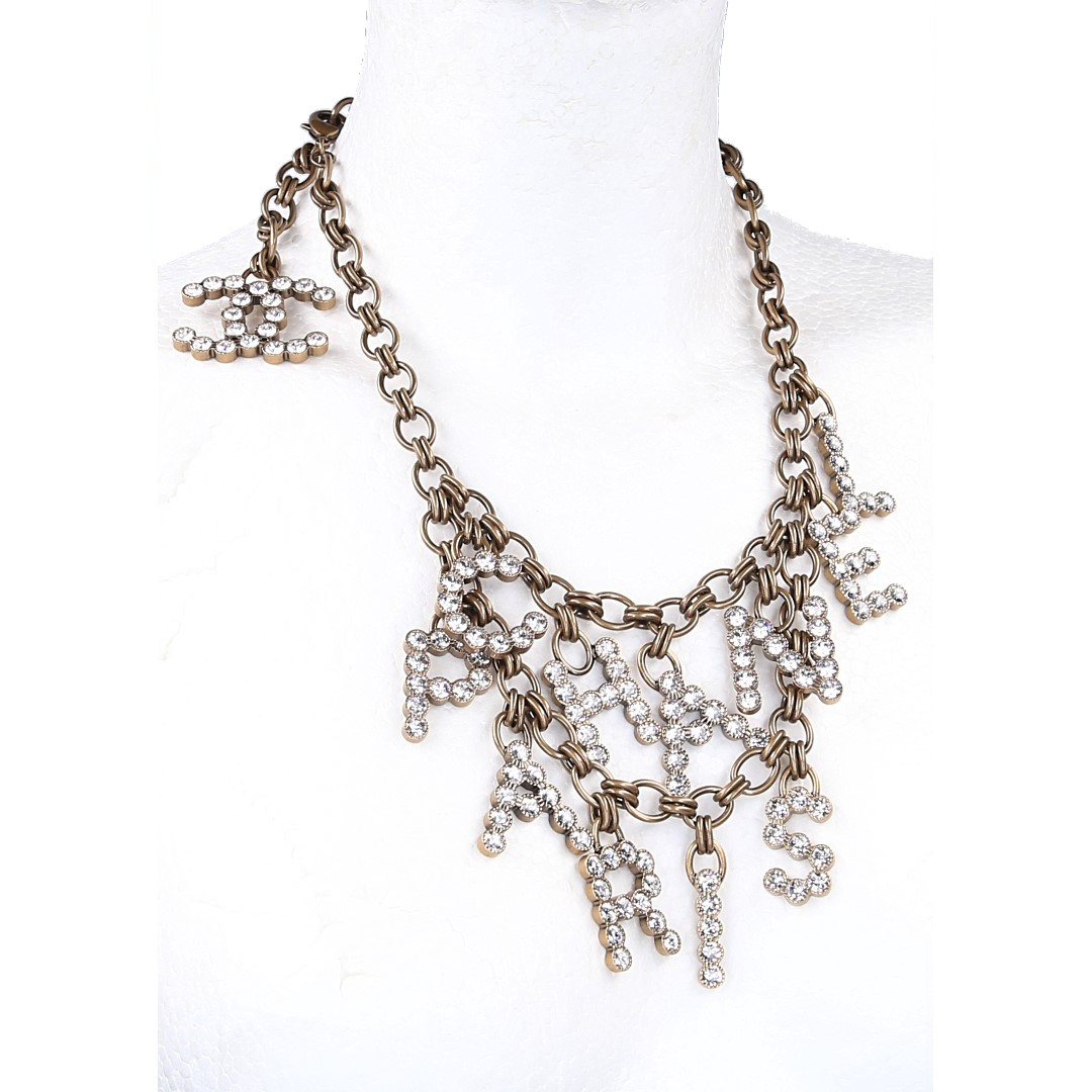 48295-Chanel-Halskette2_2D_0003 CHANEL HALSKETTE AUS ALTGOLDFARBENEM METALL MIT STRASS BESETZT