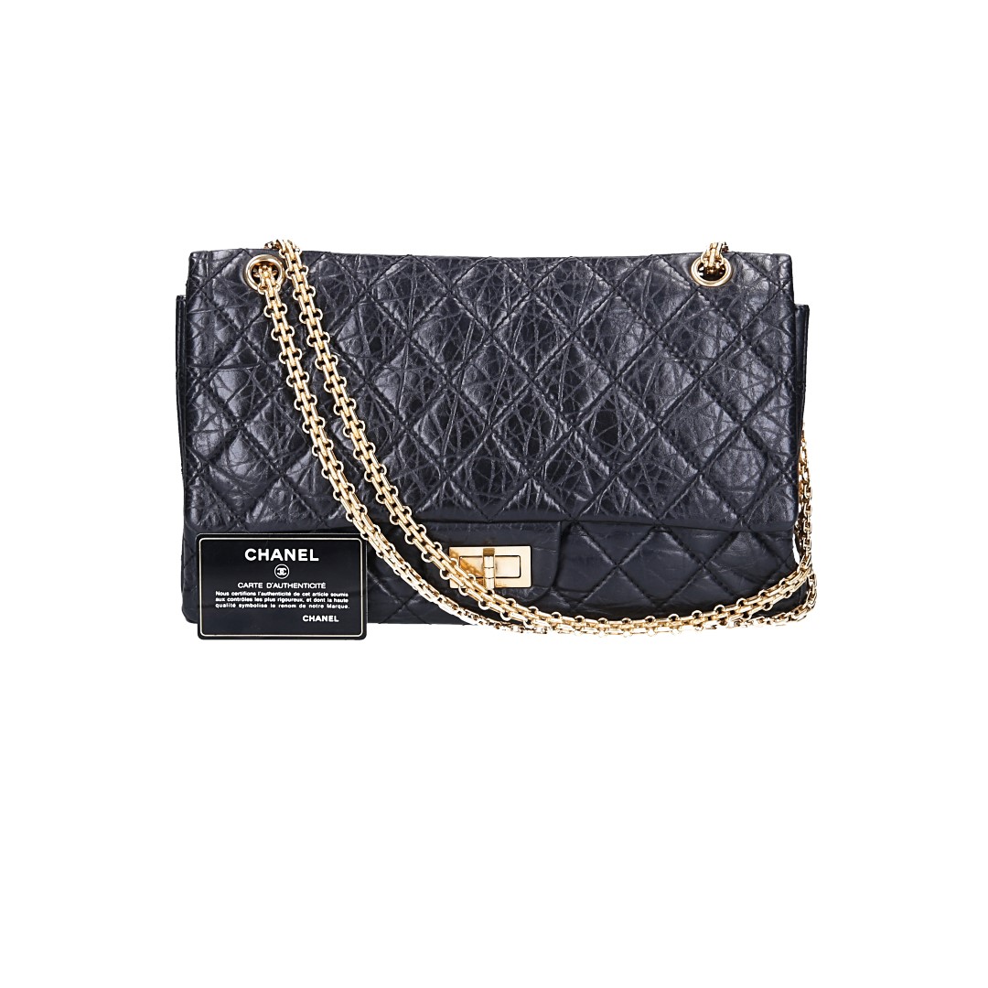 CHANEL 2.55 Reissue Flap Handbag (227) Made of Textile in Raspberry Red