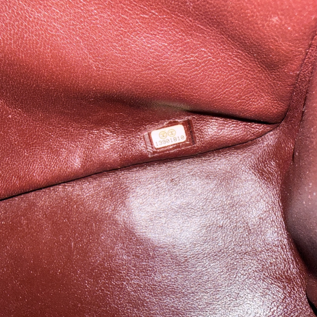 CHANEL 2.55 Reissue Flap Handbag (227) Made of Textile in Raspberry Red