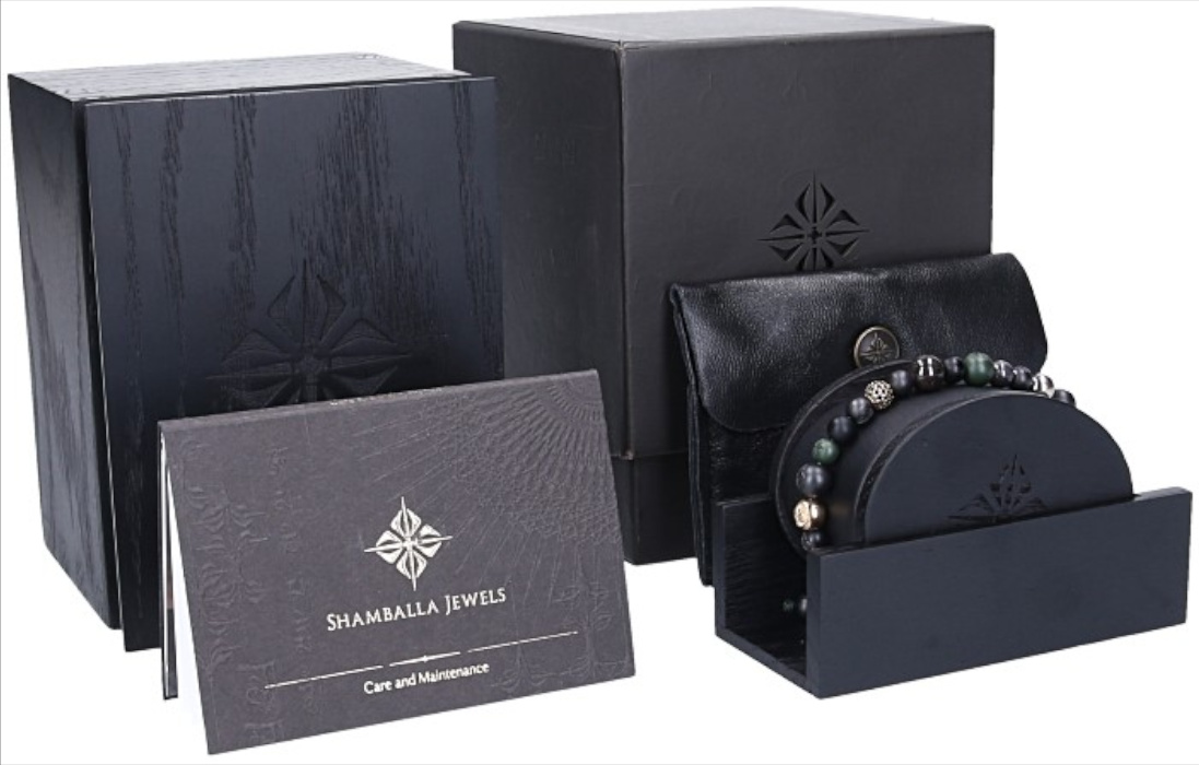 SHAMBALLA JEWELS ARMBAND MIT ELEMENTEN AUS 750er GELB- UND WEIßGOLD, KERAMIK, SAPHIREN, ONYX