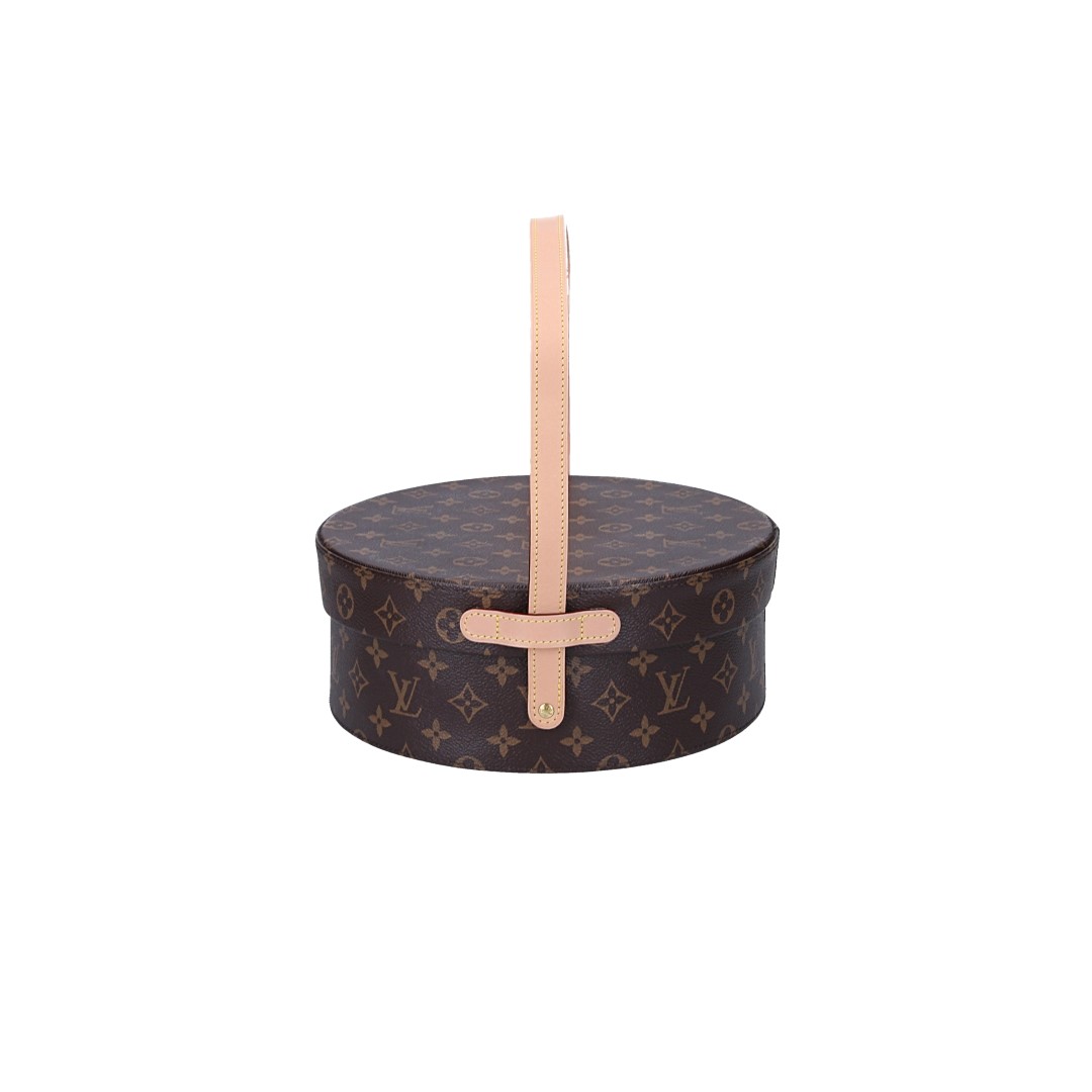 LOUIS VUITTON ROUND TEA BOX AUS MONOGRAM CANVAS (M20140)