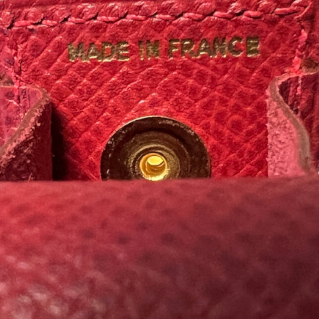 HERMÈS ETUI AUS GENARBTEM LEDER IN ROT MIT GHW