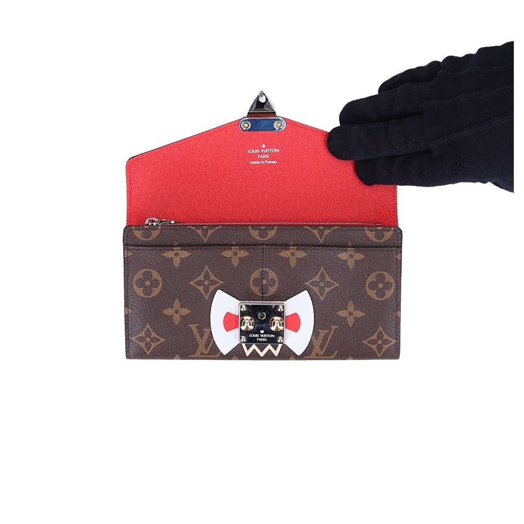 LOUIS VUITTON GELDBÖRSE 'SARAH' AUS MONOGRAM TRIBAL MASK CANVAS (M60791)